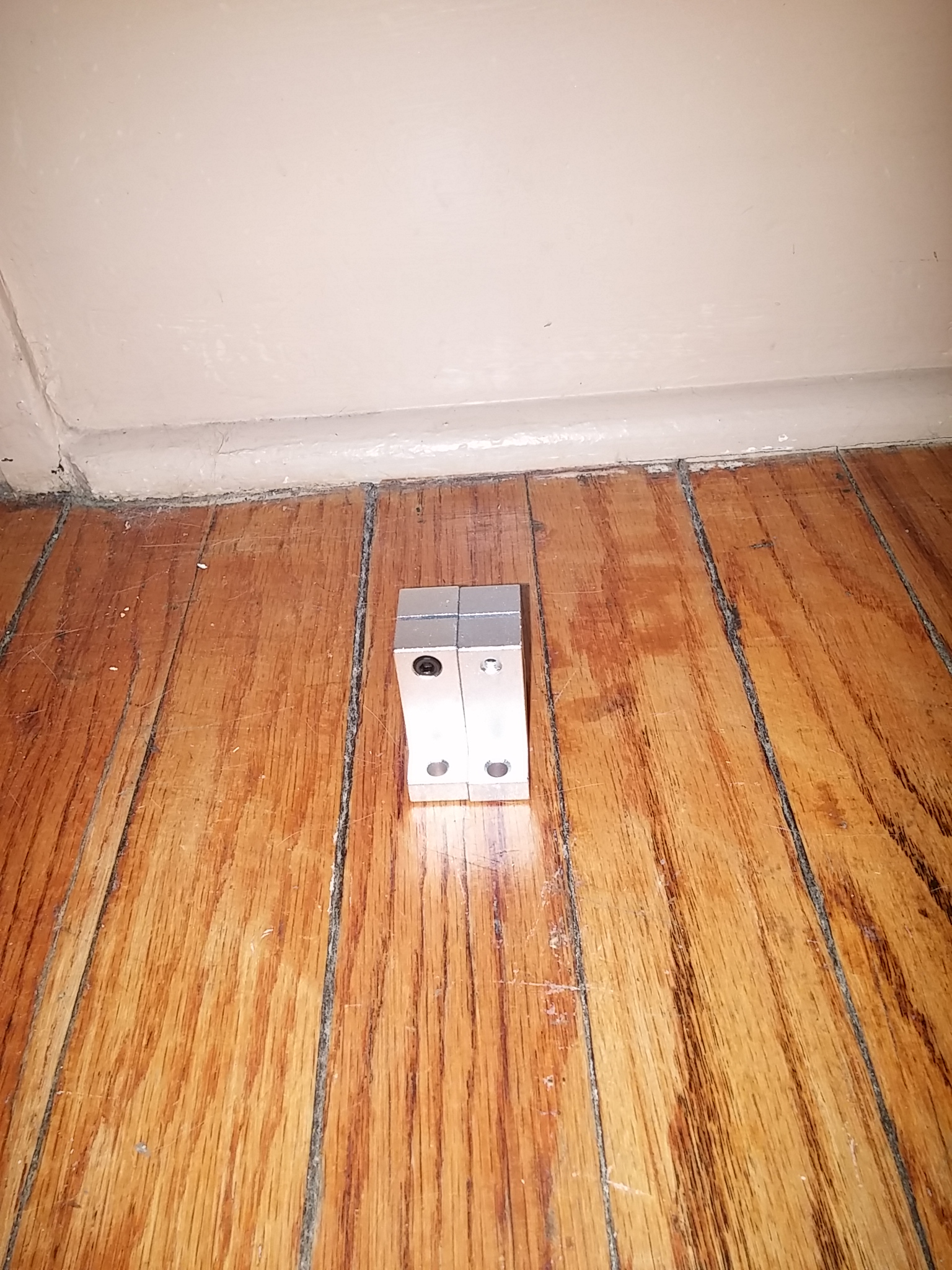 Z-axis guide rod mounts and stepper motor coupler